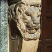 Interior.  Ground floor.  Hallway.  Fireplace.  Detail of decorative lion heads.