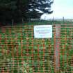 Demarcation, Cairn 13, showing netlon fencing and signage in place, Phase 2 and 3, Penmanshiel Wind Farm, Scottish Borders, Scottish Borders