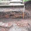 Watching brief, SE facing foundation trench section. 010 over 003, Brookfield, The Bow, Coldingham, Scottish Borders