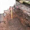 Watching brief, Foundation trench end section showing existing house built on 010, Brookfield, The Bow, Coldingham, Scottish Borders