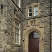 Detail of entrance with datestone at Old High School (now residential), Priory Lane, Dunfermline