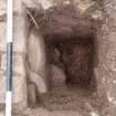 Archaeological excavation, Sondage C down the side of wall 112, Queen Street, Jedburgh