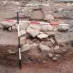 Archaeological excavation, Sondage B extended to the west side of wall 110, Queen Street, Jedburgh