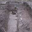 Archaeological evaluation, Culvert 004 showing fire clay pipe, Queen Street, Jedburgh