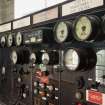 Interior.  Turbine Hall. Mezzanine/First floor.  Detail of generator set MC2 section of original 1933 control panel