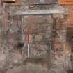 Standing building survey, Room 1/6, N-facing elevation, corner press with shelving scars, 85-87 South Bridge, Edinburgh