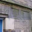 Detail of carved stones beside doorway to No 84 Canongate, Nisbet of Dirleton's House, 82-4 Canongate, Edinburgh.