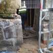 Watching brief, Working shot of the removal of 19th century masonry blocking the window of the Norman part of the church, 401-2 Strathbrock Parish Church, Uphall