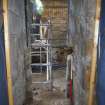 Watching brief, Working shot of the removal of 19th century masonry blocking the window of the Norman part of the church, 401-2 Strathbrock Parish Church, Uphall