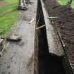 Watching brief, General shot of the pipe trench facing the church, 401-2 Strathbrock Parish Church, Uphall