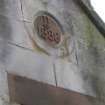 Detail of '1886' datestone in central gable of No 21 Castle Street, Port Bannatyne, Bute.