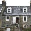 General view from south-west showing rear elevation of Nos 61, 62 and 63 Marine Road, Port Bannatyne, Bute.