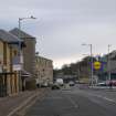 General view from west showing supermarkets on Main Street, Bo'ness.