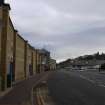 General view of supermarkets on Main Street, Bo'ness.