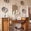 Interior.  Dining room.  View of sideboard and ceramics.