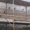 Detail of upper level of east elevation showing projecting timber beams at 21 Queen Anne Street, Dunfermline.
