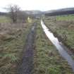 Archaeological evaluation, General view of cairn within setting on railway, Site 622, Borders Railway Project