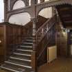 Interior.  Ground floor.  Entrance hall.  View of staircase and arched screen.