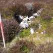 Cultural heritage assessment, Site 2 bank showing stone coursing, Crakaig Windfarm, Highland