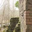 View from south east, detail of ruinious lade supports. The lade would have been positioned ontop of these and would have carried water from the lade to the top of the water wheel. 