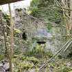 Interior. View from north west of main mill building. Note mill stones. 