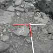 Deposits over fill of inner wall in north part of Trench, notably small sharp stone chips, intramural passage to left, electricity pole hole to right - adhesion to large slab is concrete, modern