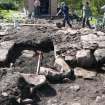 Time Team trench, entrance to passage and beginning on left of paving which rises to higher level (not yet exposed)