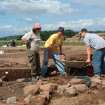 Archaeological excavation, CS2 removal of large stone, Knowes Farm, Traprain Law Environs Project Phase 2, East Lothian