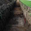 Evaluation photograph, Trench 1 completed showing river valley contours, Land to SW of Birse Church, Birse, Aboyne