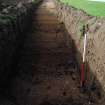 Evaluation photograph, Trench 1 completed showing river valley contours, Land to SW of Birse Church, Birse, Aboyne