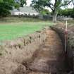 Evaluation photograph, NE end trench 1 showing palaeochannel, Land to SW of Birse Church, Birse, Aboyne