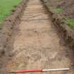 Evaluation photograph, Trench 2 SE end deep plough marks and shallow topsoil, Land to SW of Birse Church, Birse, Aboyne