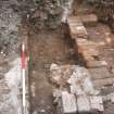 Archaeological evaluation, Area of broken surface in trench 49, Cathcart Road, Glasgow
