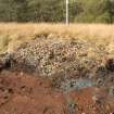 Trial trench evaluation, Cairn 1 during de-turfing, Kilmelford, Argyll