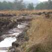 Trial trench evaluation, General view of Cairn 1 looking from Cairn 3, Kilmelford, Argyll