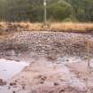 Trial trench evaluation, Cairn 1 after de-turfing Trench 12, Kilmelford, Argyll