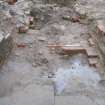 Archaeological excavation, Red brick walls (130) and (131), Glasgow Commonwealth Games Village, Dalbeath, Glasgow