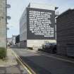 Mural by Robert Montgomery, created as part of the Nuart festival, 2017. View from south east from Jopp's Lane. 