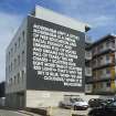 Mural by Robert Montgomery, created as part of the Nuart festival, 2017. View from south east from Jopp's Lane. 
