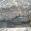 Evaluation Photograph, Trench 1. Post-excavation, north-facing section, facing SW, Harvester's Way, Wester Hailes