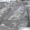 Archaeological excavation, General shot of concrete bases in N side of trench, Post Office Sorting Depot, Brunswick Road, Edinburgh