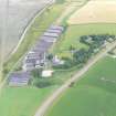 Oblique aerial view of Glenmorangie Distillery, Tain, Easter Ross, looking N.