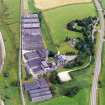 Oblique aerial view of Glenmorangie Distillery, Tain, Easter Ross, looking E.