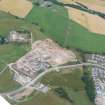 Oblique aerial view of Culduthel Farm development, Inverness, looking SW.