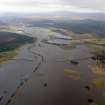 Oblique aerial view of flooded Strathspey between Broomhill/Nethy Bridge and Dulnain Bridge, looking NE.