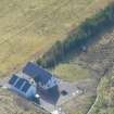 Aerial view of modern house Croft 14, Big Sand, near Gairloch, Wester Ross, looking SE.