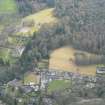 Oblique aerial view of Cawdor village, Castle and gardens, E of Inverness, looking SE.