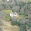 Oblique aerial view of Lickleyhead Castle, Aberdeenshire, looking SE.