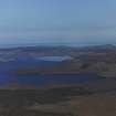 Oblique aerial view of Aultbea, over Cnoc Breac and the Isle of Ewe, Wester Ross, looking NE.