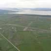 Oblique aerial view of Tain airfield and the Dornoch Firth, looking NW.